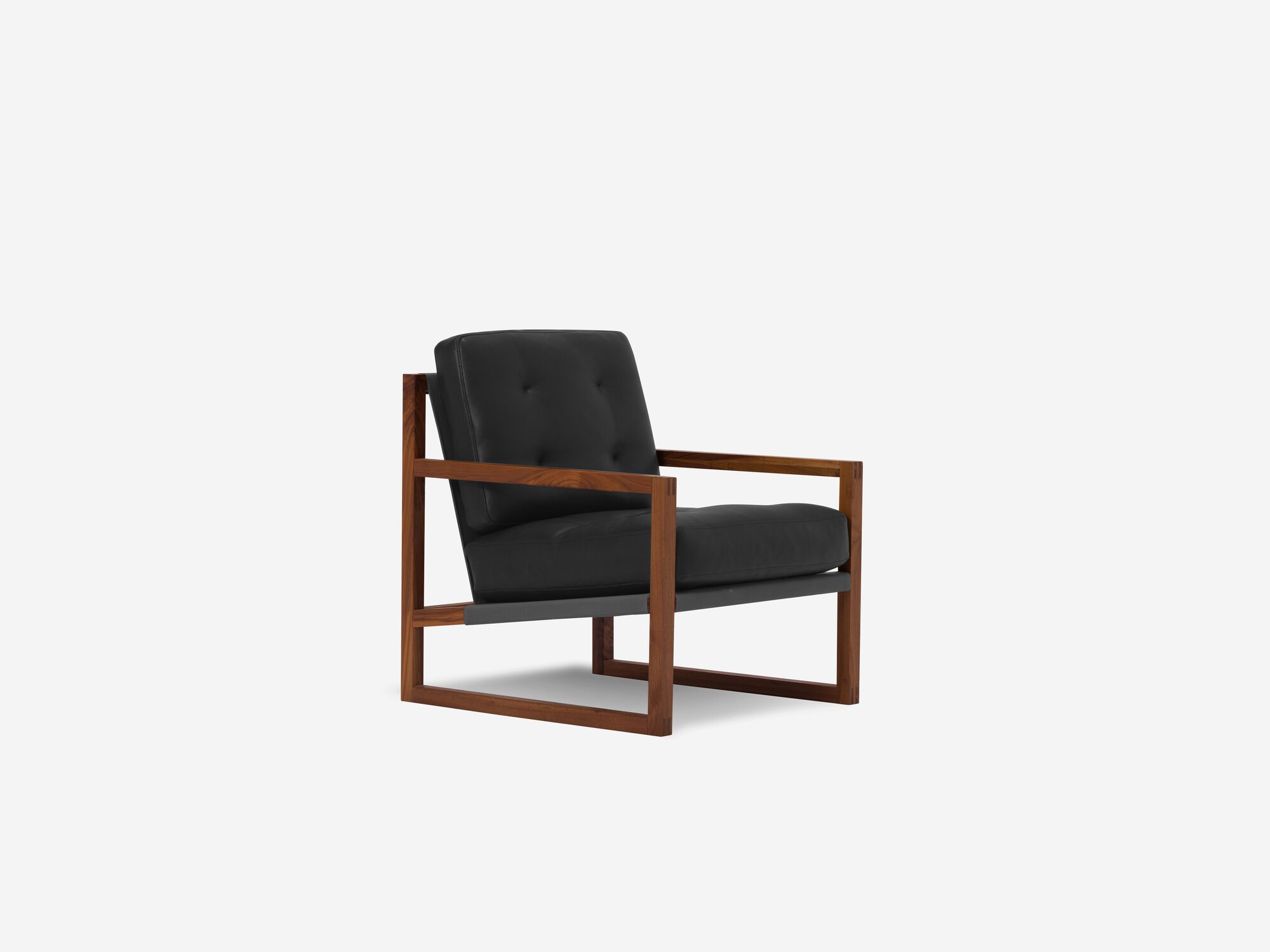 Black and walnut tufted lounge chair front angle view